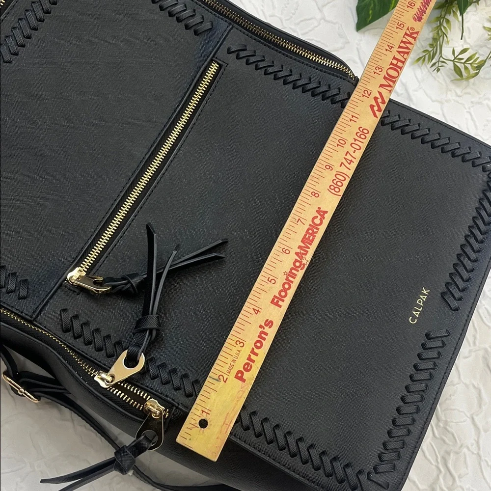 Calpak Black Backpack with Gold Zippers